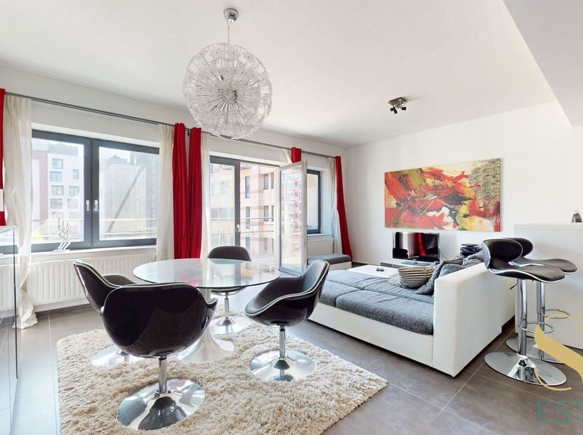 MARCEL THIRY - Spacieux appartement 2 chambres avec 2 terrasses, situé dans la résidence prisée T-House à Woluwe-Saint-Lambert. Ce bien lumineux et pa