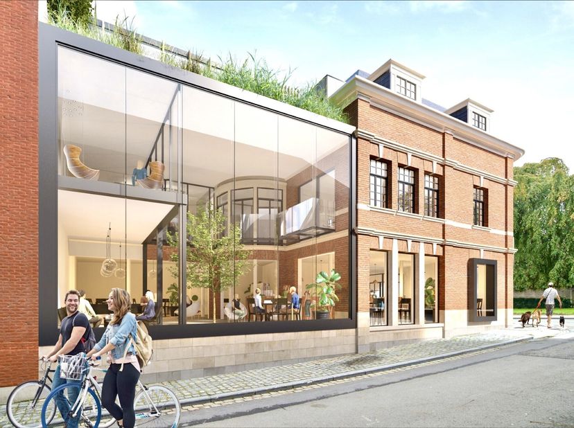 In het hart van haar historisch erfgoed, op 75 meter van de Broeltorens en uitgevend op de verlaagde Leieboorden creëerde architect Ward Van Kerckhove