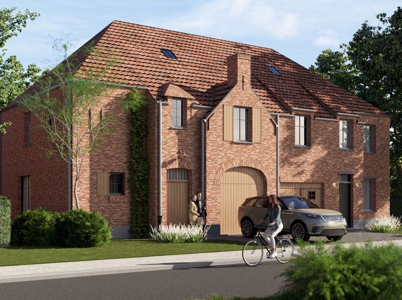Lot 8 in het charmante project Vogelzang vormt een harmonieuze mix van karaktervolle architectuur en hedendaagse woonkwaliteit. Achter de stijlvolle g