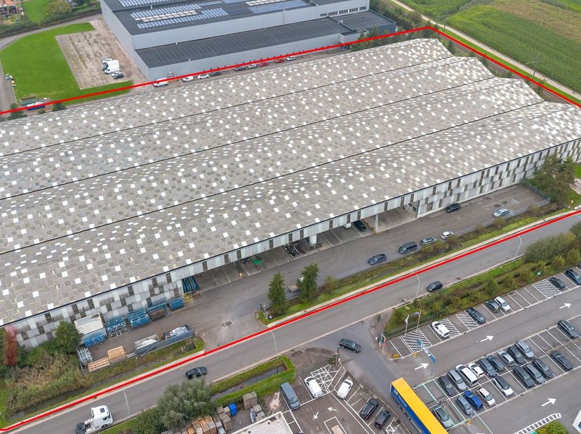 INVESTERINGSOPPORTUNITEIT! Stand alone bedrijfsgebouw (gelauwerd met architectuurprijs) bestaande uit 12.881 m² opslagruimte met 2.364 m² kantoren en