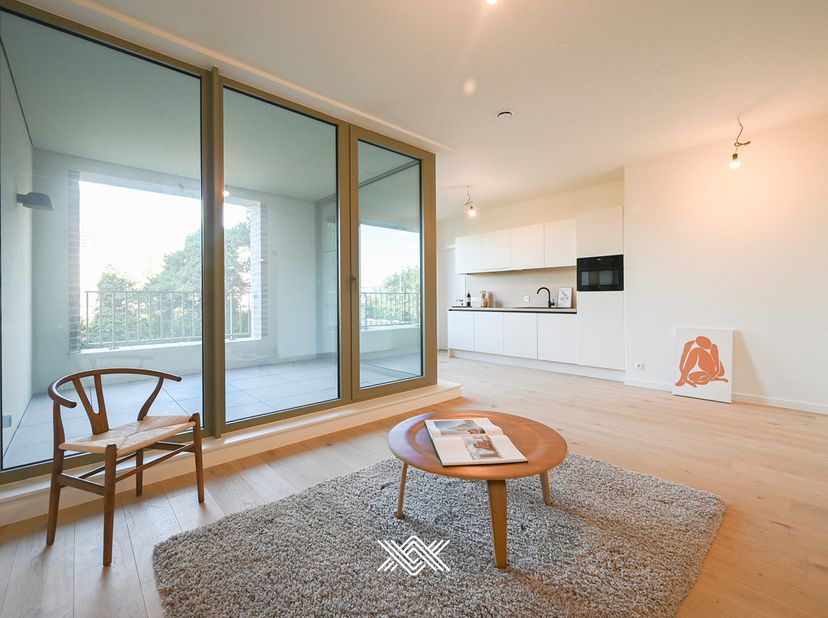 Dit nieuwbouwappartement met 1 slaapkamer is gelegen op de eerste verdieping van Liv de Molens, in het hartje van Deinze. Het appartement van 64 m² is
