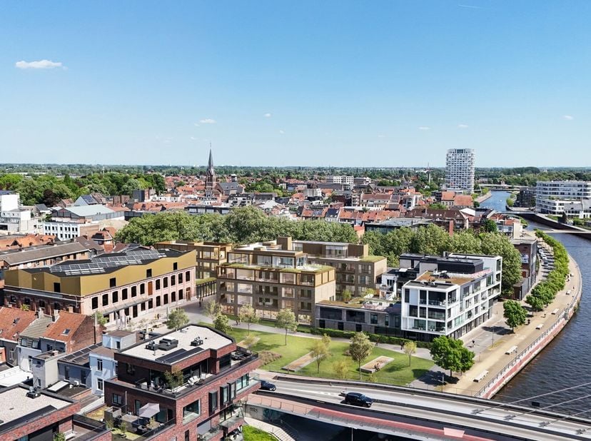 Aan de Leieboorden in Kortrijk verrijst binnenkort DamasK: twee stijlvolle, moderne gebouwen die het rijke textielverleden van de stad nieuw leven inb