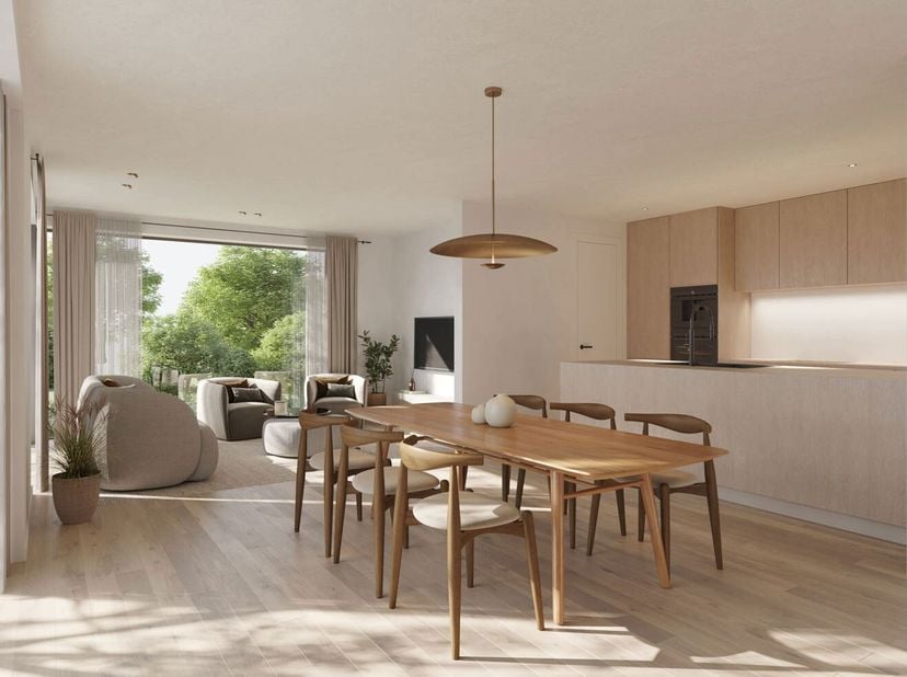 Dit nieuwbouwappartement situeert zich op het gelijkvloers van nieuwbouwresidentie Kouterhof. Het pand omvat een inkomhal, een lichtrijke living met o