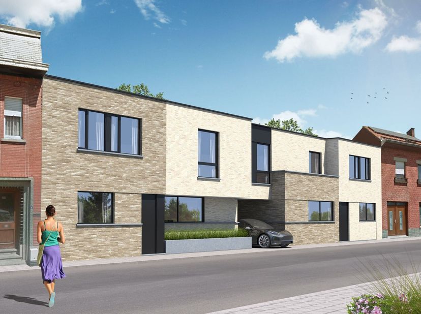 Dit nieuwbouwproject, op wandelafstand van het centrum van Sint-Eloois-Winkel bestaat uit 4 x moderne en energiezuinige woningen met plat dak.  Aan de