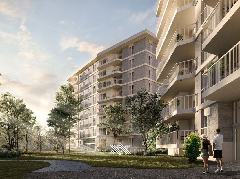 Dit drieslaapkamer appartement van 107 m² op het vierde verdiep beschikt over een inkomhal met plaats voor een vestiairekast, een lichtrijke eet- en l
