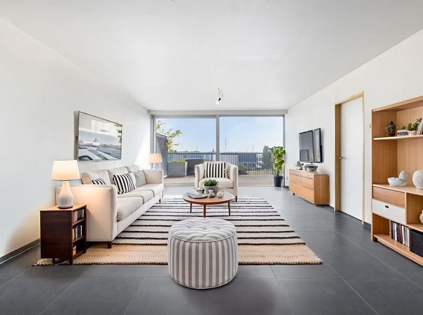 In het populaire Dok-Noord bieden we dit instapklare appartement aan op de vierde verdieping, met een bewoonbare oppervlakte van 88m² en een zonnig te