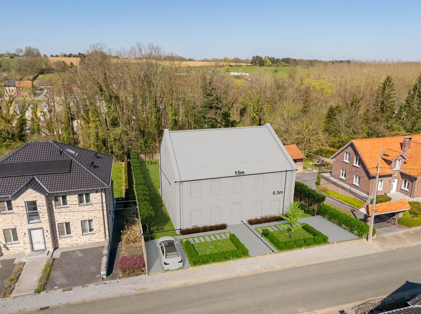 BOUWGROND VAN 12,70 ARE IN GROENE OMGEVING NABIJ HET CENTRUM VAN HULDENBERGBent u op zoek naar een bouwgrond voor een open bebouwing in een groene, re