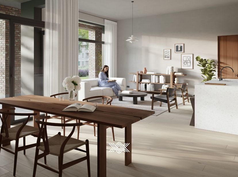 Deze maisonnette van 175 m² is verdeeld over twee bouwlagen en beschikt over een lichtrijke eet- en leefruimte met extra hoge plafonds en rechtstreeks
