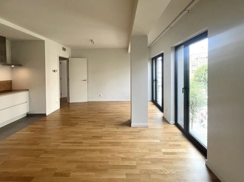 QUARTIER DIAMANT - Dans une construction récente, lumineux appartement  1 chambre d&#039;une superficie de 58 m². Situé au 3 ème étage, il se compose d&#039;un