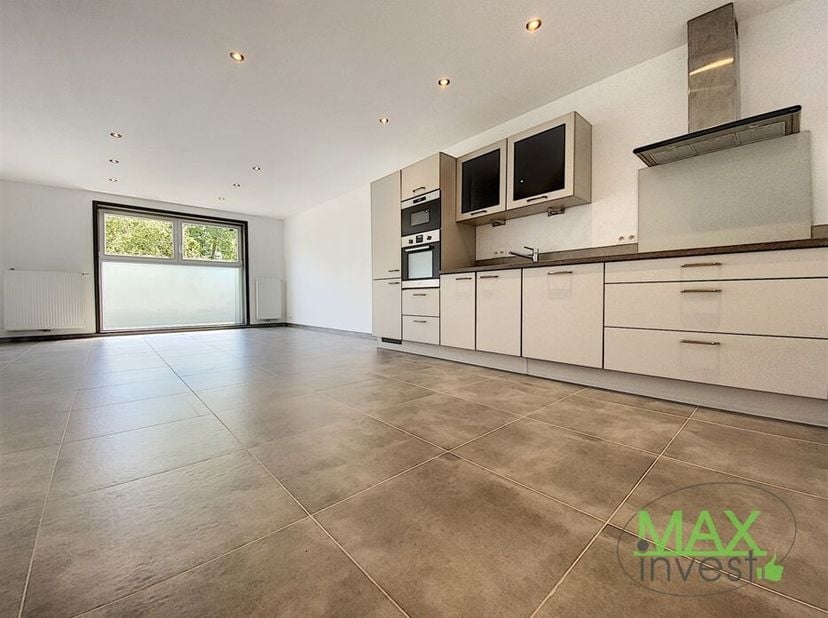 Superbe duplex NEUF idéalement situé à Dottignies, dans une petite résidence de 2 appartements et rue calme.  &lt;br /&gt;
Logement de qualité avec 2 chambr