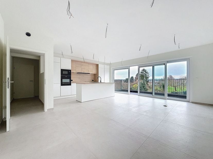 BHS IMMO a le plaisir de vous proposer cet appartement neuf de 95 m², situé à Ans proche de toutes les commodités . Il comprend un hall d&#039;entrée, un s