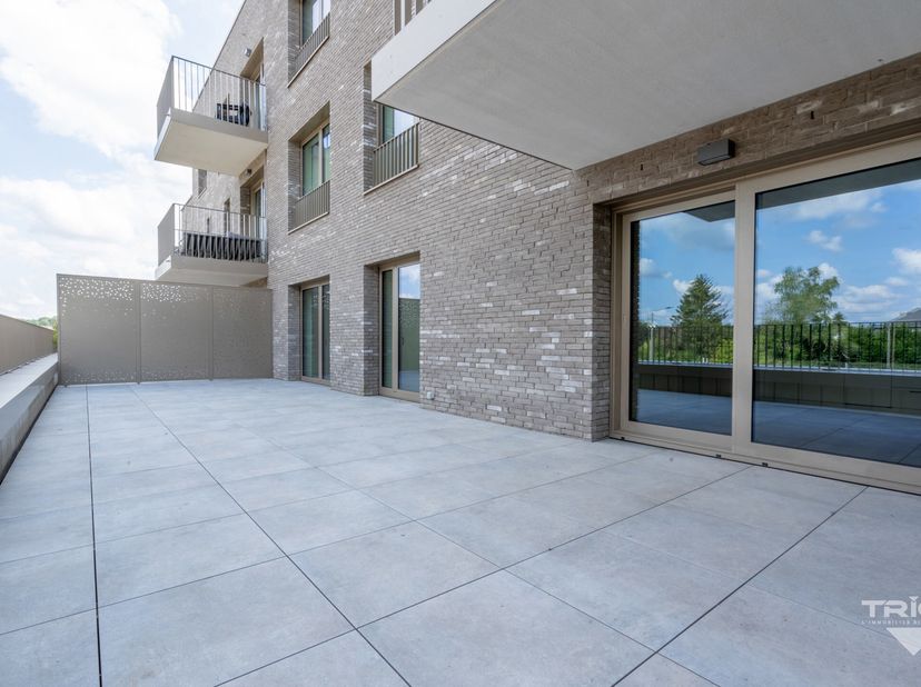 TRIOR Nivelles vous propose ce magnifique appartement NEUF  (PEB A+) dans le nouveau projet immobilier &quot;Îlot Saint Roch&quot;, situé à distance à pied de l