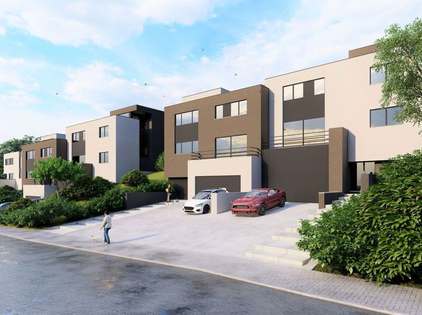 BAULERS - Ensemble de 4 terrains à bâtir avec permis octroyé pour la construction de grandes maisons unifamiliales 3 façades avec garage et jardin, l&#039;
