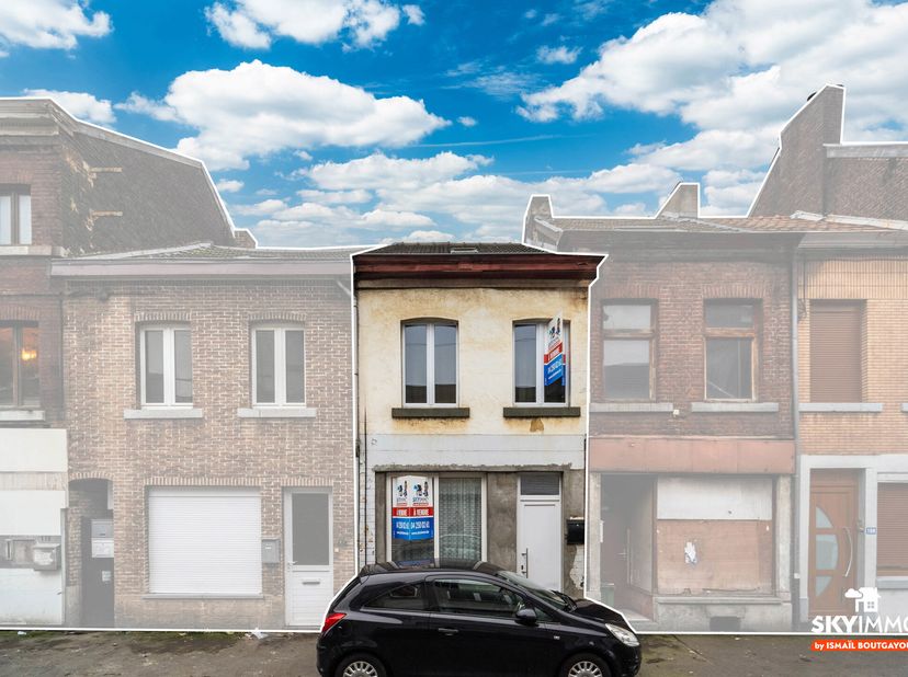 L&#039;agence  SKYIMMO a le plaisir de vous proposer cette maison située à  Seraing, ce bien est composé comme suit :&lt;br /&gt;
AU RDC  : Salon (14) - Salle à