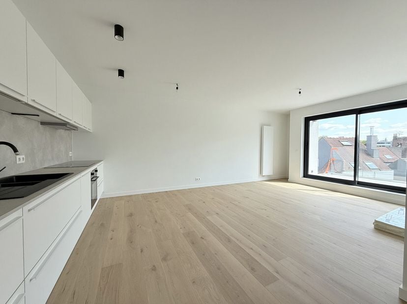 Victoire-Junot vous propose à Woluwe-Saint-Lambert, à proximité de l&#039;arrêt de tram Chien Vert, agréable appartement neuf de 80 m² situé au troisième e