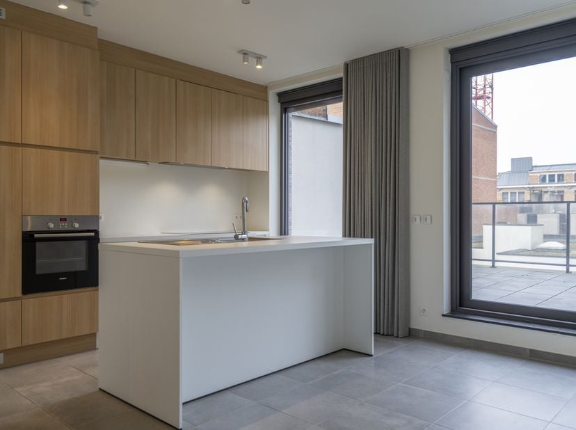 Op zoek naar een energiezuinig appartement met groot terras te koop in centrum Kortrijk?&lt;br /&gt;
Bekijk zeker dit schitterend appartement te koop te Kor