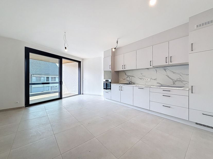 Dit gloednieuwe appartement, gelegen in het energiezuinige nieuwbouwproject &quot;Daniël &amp; Zozima&quot; in de Baanstknokstraat 1 te Waregem, biedt het beste van