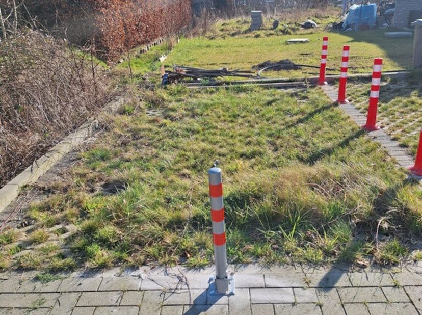 Parkeerstrook in de kleinschalige verkaveling Rootputhof in het gebied tussen Nieuwe Molenstraat, Vijfstraten en Vlasstraat te Sint-Niklaas. Rootputho