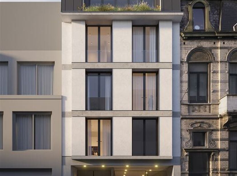 Superbe et unique maison d&#039;atelier neuve (+/- 234 m2) avec terrasses (24 m2) alliant logement et activité professionnelle sise dans un îlot intérieur,