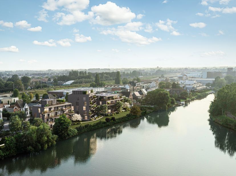Dit tweeslaapkamer appartement van 92 m² bevindt zich op de eerste verdieping van het project Leiemeersen gelegen vlak langs de Leie in Astene. Het co