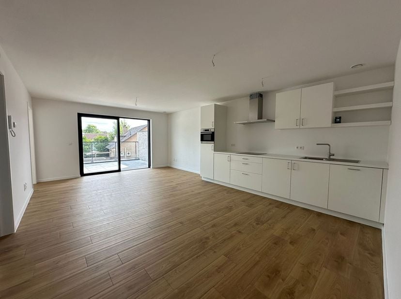 Ontdek dit moderne appartement op de eerste verdieping van het gloednieuwe wooncomplex Di Livin in Pelt. Dit ruime en energiezuinige appartement biedt