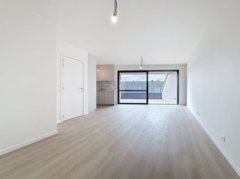 Dit gloednieuwe appartement, gelegen in het energiezuinige nieuwbouwproject &quot;Daniël &amp; Zozima&quot; in de Baanstknokstraat 1 te Waregem, biedt het beste van