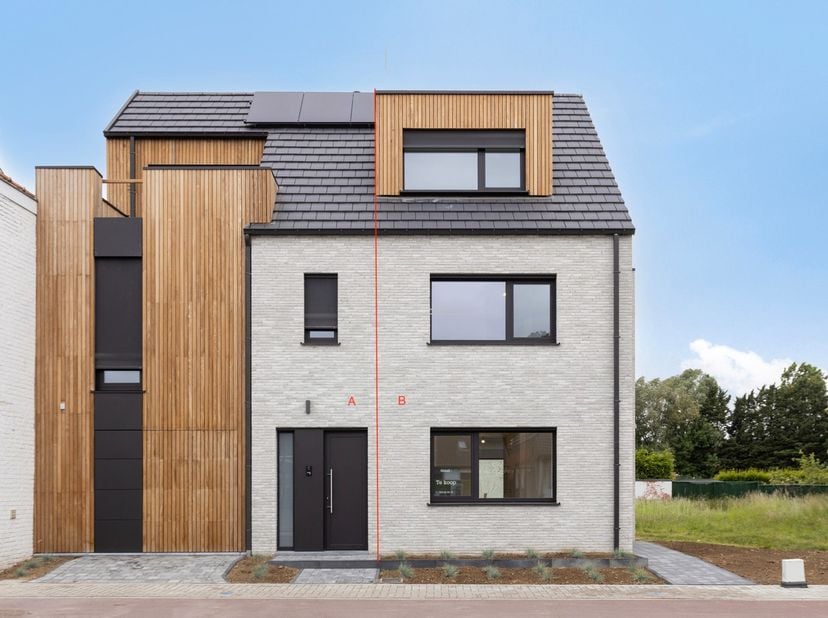 Moderne woning, gelegen in het centrum met alle voorzieningen (ziekenhuis, winkels, scholen, ...) in de onmiddellijke nabijheid en een perfecte ontslu