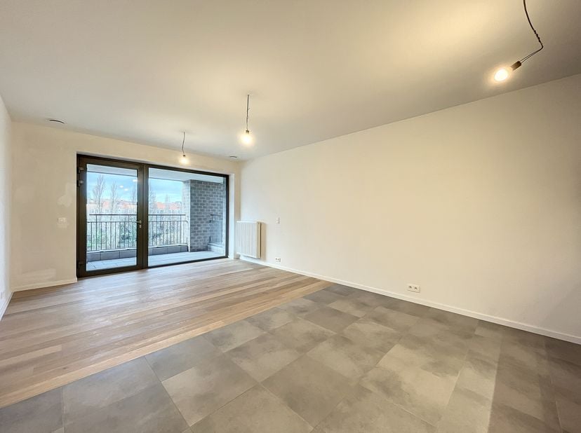 Appartement moderne et lumineux à louer sur le dynamique site de Tour &amp; Taxis, dans limmeuble &quot;Central&quot;.&lt;br /&gt;
Excellente accessibilité en transports
