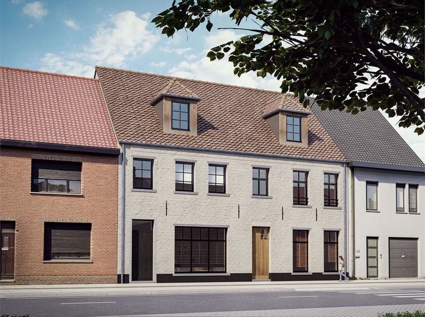 Deze nieuwbouwwoning is gelegen aan de Lage Kaart in Brasschaat, vlak bij de kruising met de Hanendreef. Deze moderne middenwoning combineert een door