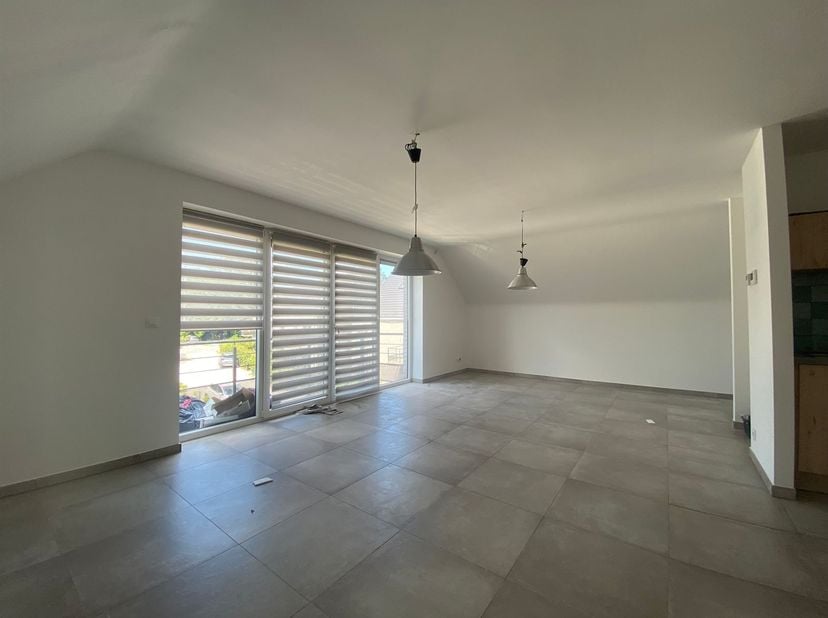 MCA Immobilier vous propose cet appartement situé au 2ᵉ étage de la résidence Bois de la Rochette à Hollogne. <br />
<br />
Il se compose d’un hall d’