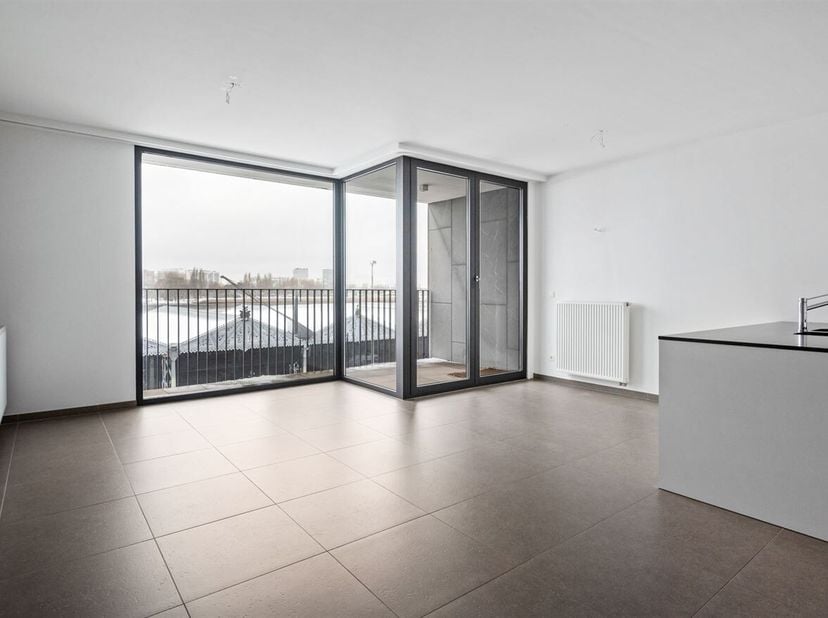 Luxe- appartement (90 m²) met terras aan de Scheldekaaien<br />
Ligging:<br />
Op een uitstekende locatie aan de Scheldekaaien, met een prachtig open
