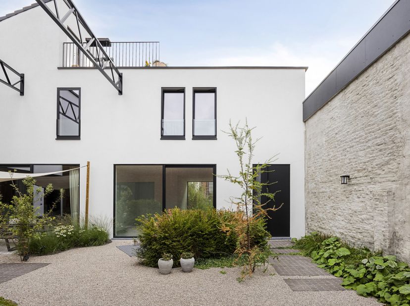 Energiezuinige nieuwbouwwoning met tuin en 3 slaapkamers nabij de Leie in Kortrijk<br />
Ontdek deze kwalitatief afgewerkte nieuwbouwwoning op een uit