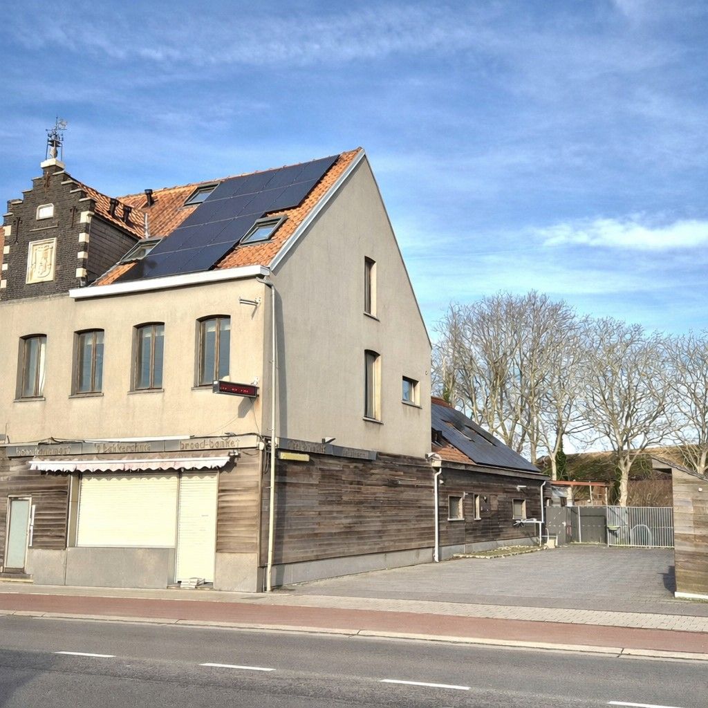 Handelspand met woonst te koop