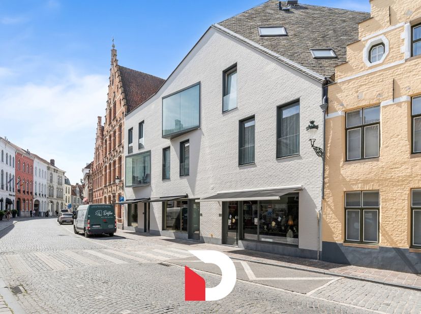 Kwalitatief appartement met 2 slaapkamers en riante buitenruimte bestaande uit een terras en tuintje die samen +/-34 m² meten, gelegen in het gerenomm