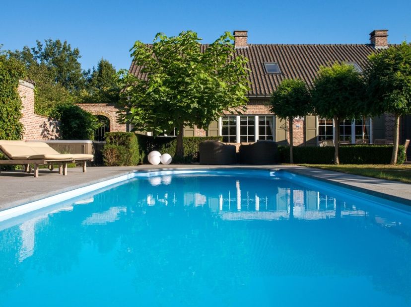 endre : grande villa ouverte à Molenstede (Diest), située dans un quartier résidentiel verdoyant avec un jardin généreux de 2823 m². Construite en 199