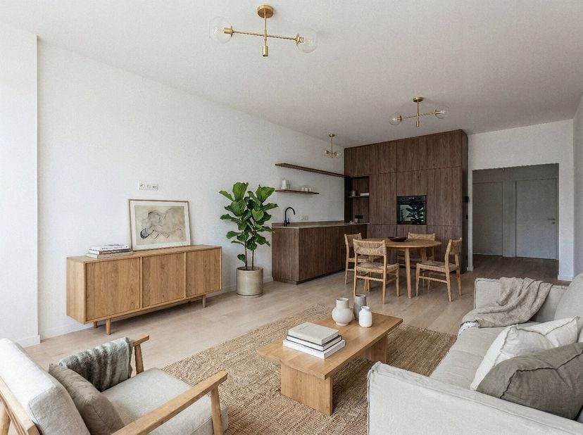 Dit prachtige gelijkvloers appartement met tuin en twee slaapkamers bevindt zich in een volledig gerenoveerd gebouw. Dankzij de hoogwaardige afwerking