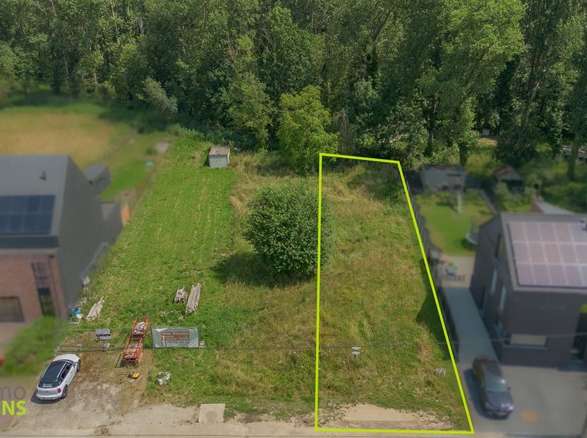 Bouwgrond voor halfopen bebouwing te Lebbeke<br />
Ontdek deze prachtige bouwgrond voor een halfopen bebouwing op een gunstige ligging nabij het poel