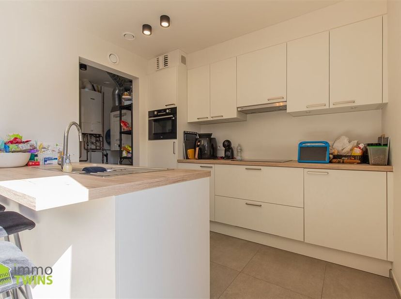 Modern gelijkvloers appartement met terras en staanplaats te Grembergen bij Dendermonde. Dit appartement maakt deel uit van een kleinschalige resident