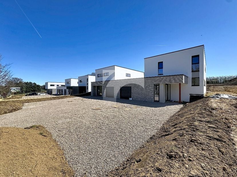 Bütgenbach - Zum Brand, lot 5: Deze moderne nulenergiewoning wordt momenteel gebouwd op een perceel van 912 m² in een rustige omgeving, op slechts 10