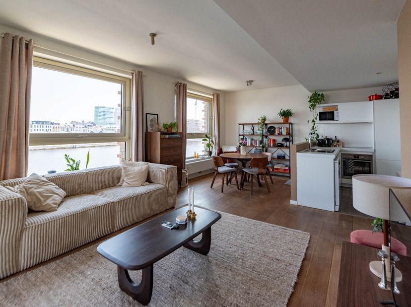Zeer mooi éénslaapkamerappartement in toren 6 van nieuwbouwproject Westkaai op 't Eilandje, met een oppervlakte van 70m2 en een terras van 12m2 met su