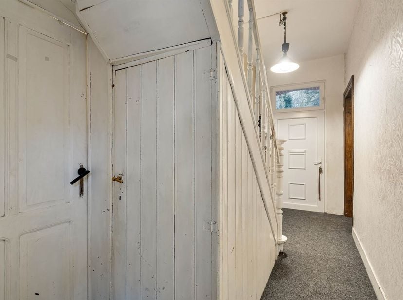Te renoveren woning in een doodlopende straat<br />
<br />
Ligging:<br />
De woning is gelegen op Reinpadstraat 118 te Genk, in een doodlopende, fi