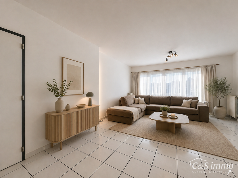 Dit ruime en lichtrijke gelijkvloers appartement combineert een praktische indeling met heel wat extra mogelijkheden.<br />
Via de inkomhal kom je bin