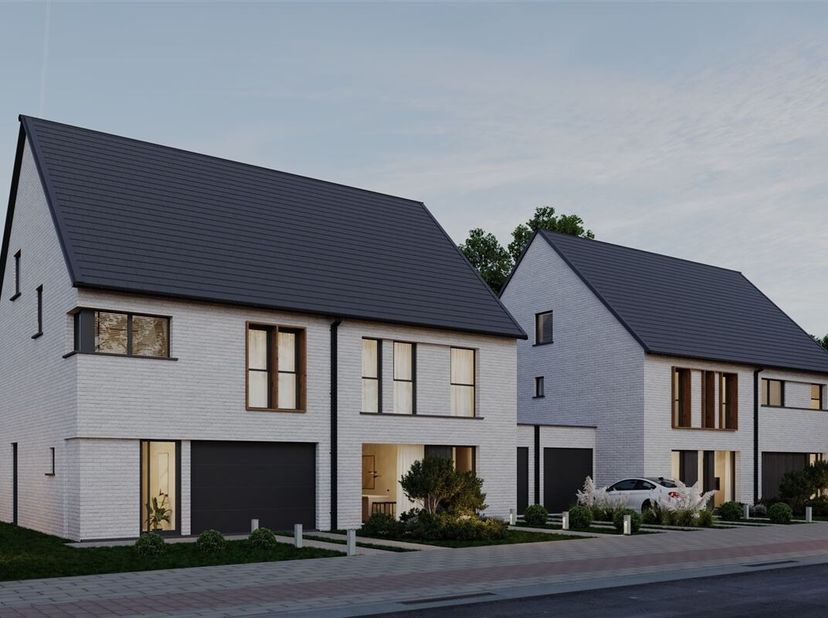 Halfopen nieuwbouwwoning die deel uitmaakt van het project Velle gelegen te Temse met 4 wooneenheden. We hebben het over de tweede woning van rechts .