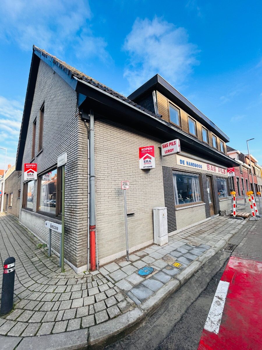 Handelspand met woonst te koop