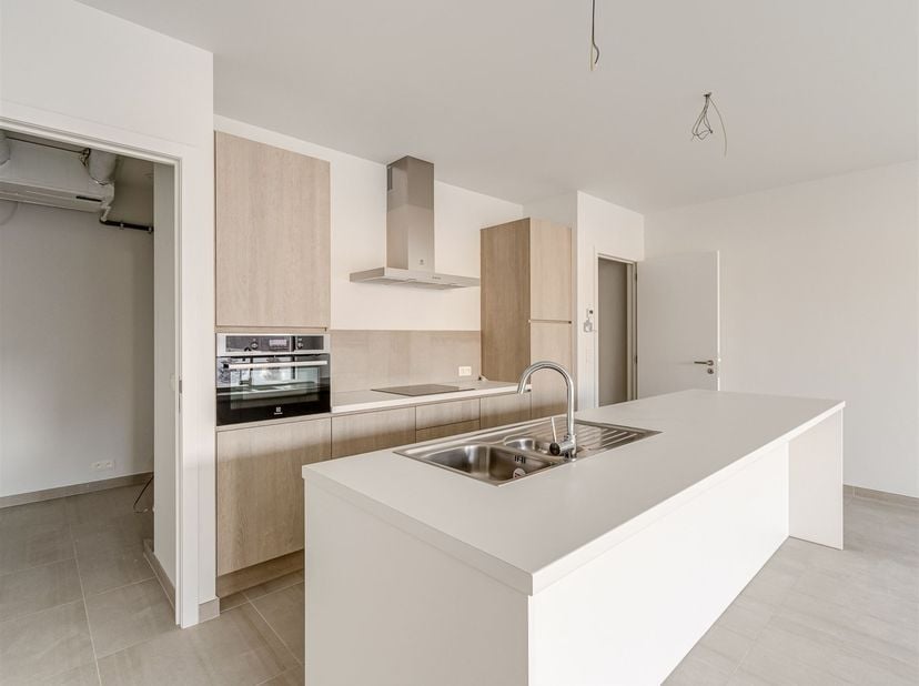 Appartement quasi neutre en énergie, comprenant deux chambres et une terrasse, dans un emplacement très agréable !<br />
<br />
Situation : Idéalement