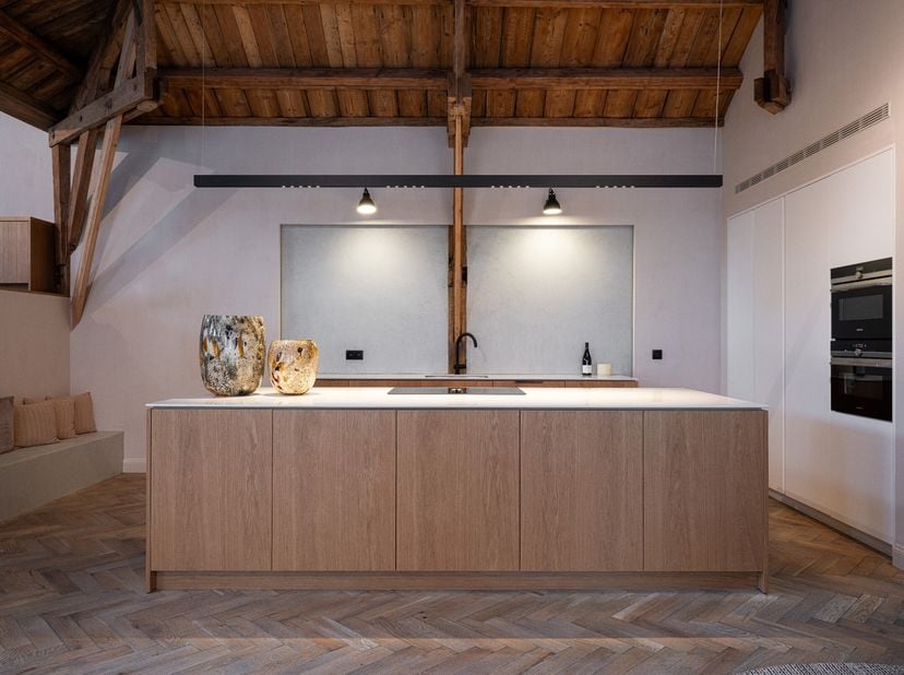 Energiezuinige loft van maar liefst 338 m² bewoonbare oppervlakte met 3 slaapkamers en evenveel badkamers maakt deel uit van een kleinschalig gebouw i