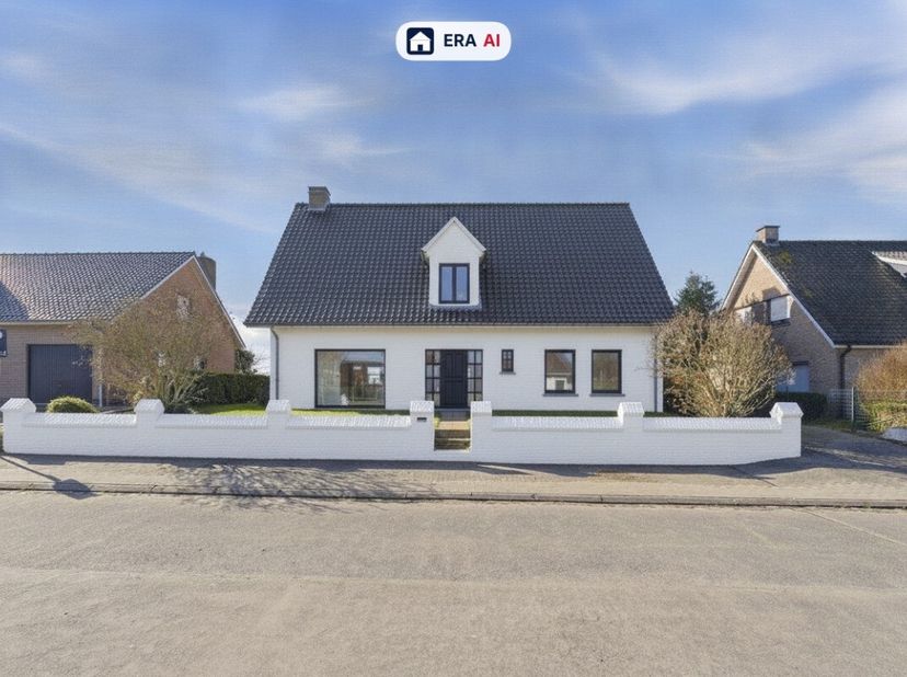 À vendre : grande maison ouverte dans le village rural de Pollinkhove, à seulement 15 minutes de Veurne. Cette habitation solide construite en 1976 of