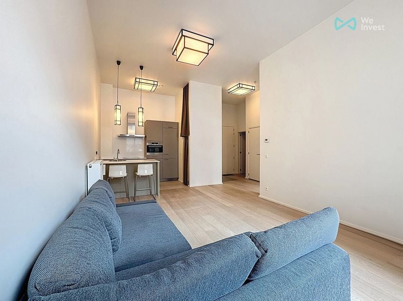 Tél : 0456 87 27 16 / E-mail : juliana.t@weinvest.be<br />
We Invest biedt u met plezier en in exclusiviteit dit prachtige éénslaapkamerappartement aa