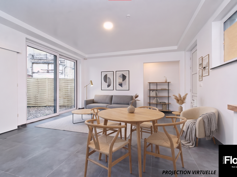 In de nabijheid van het Colignonplein biedt FLOW Real Property dit prachtige appartement met één slaapkamer van 58 m² (volgens EPC) en een tuin van on