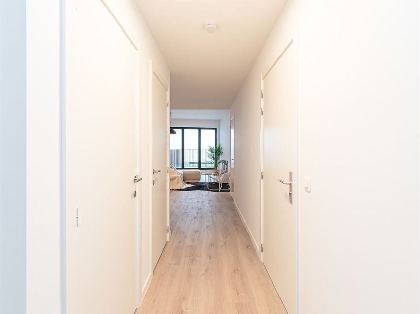 Situation : Residentie Hemelrijck, en plein centre de Brasschaat<br />
Description :<br />
Cette résidence a été construite dans une architecture cont